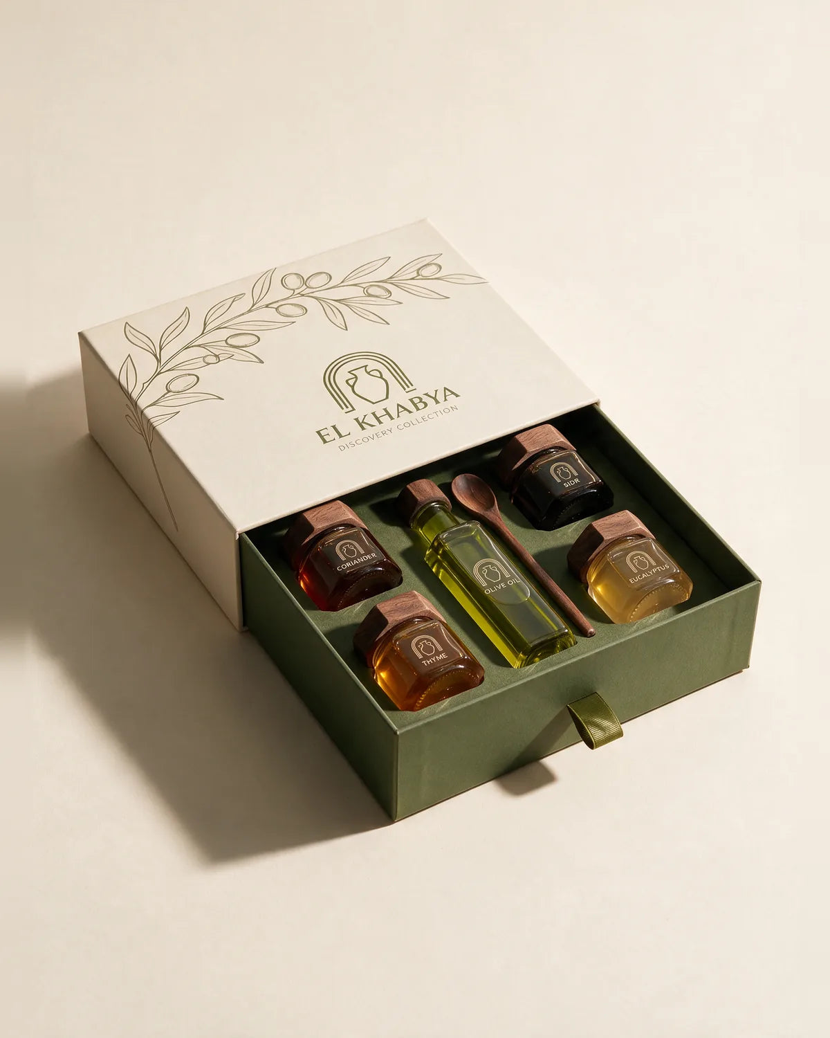 Discovery Collection — open El Khabya gift box with four honeys and Tunisian olive oil