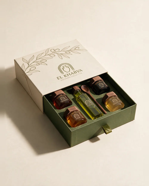 Discovery Collection — open El Khabya gift box with four honeys and Tunisian olive oil