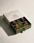 Signature Collection — open El Khabya gift box with infused honeys and spiced olive oil